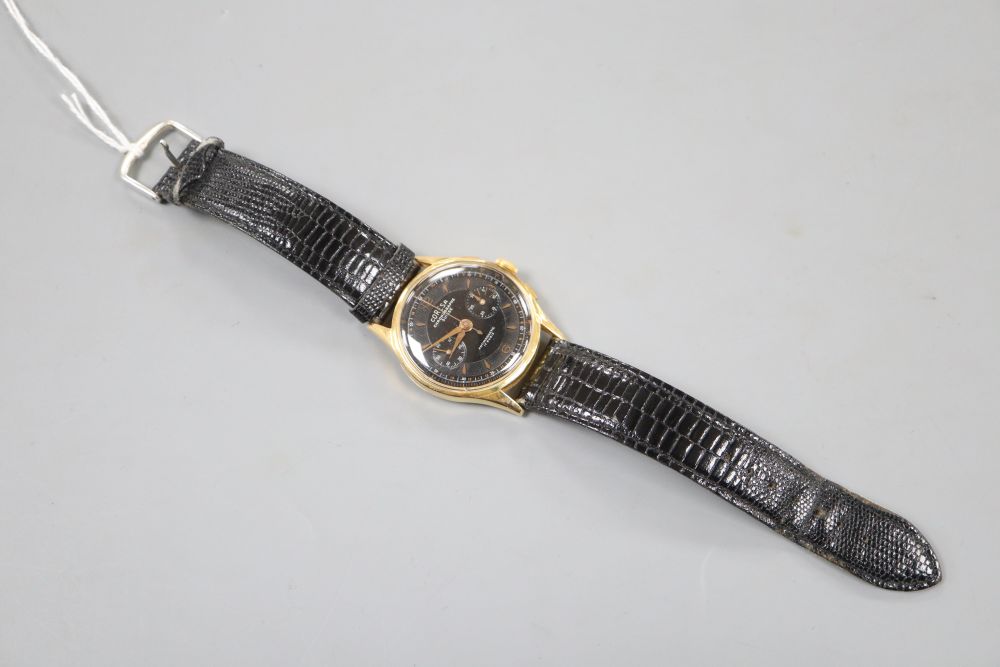 A gentlemans 1960s? 18k Coresa chronograph manual wind wrist watch, on later strap.